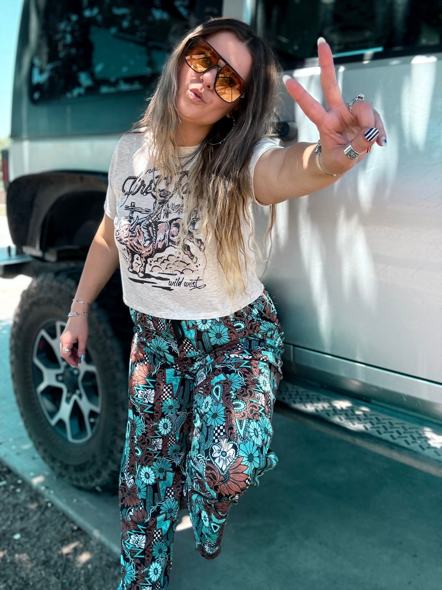 Tattoos in Turquoise Pants