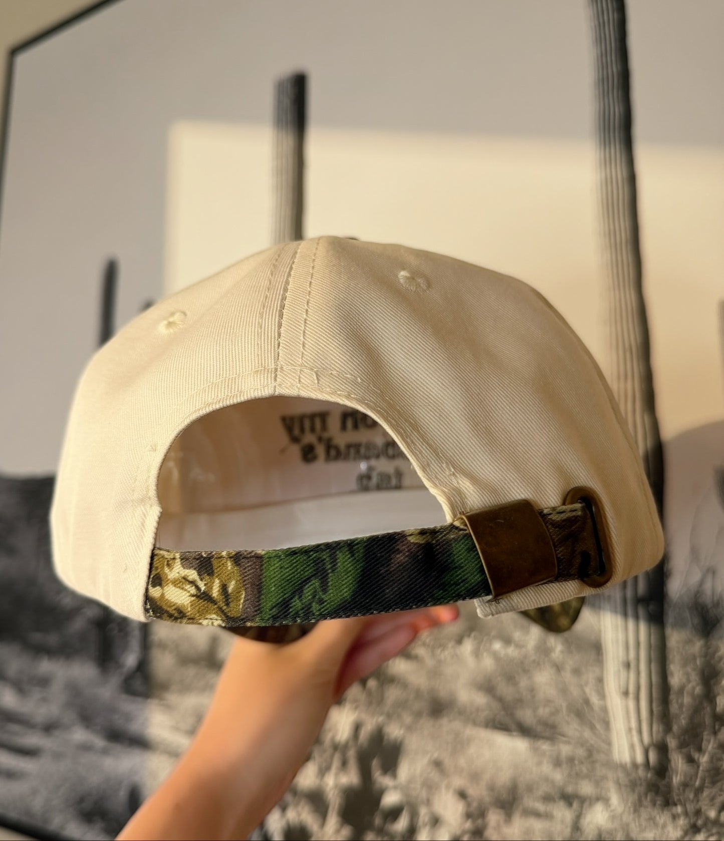 Put it on my husbands tab camo trucker hat
