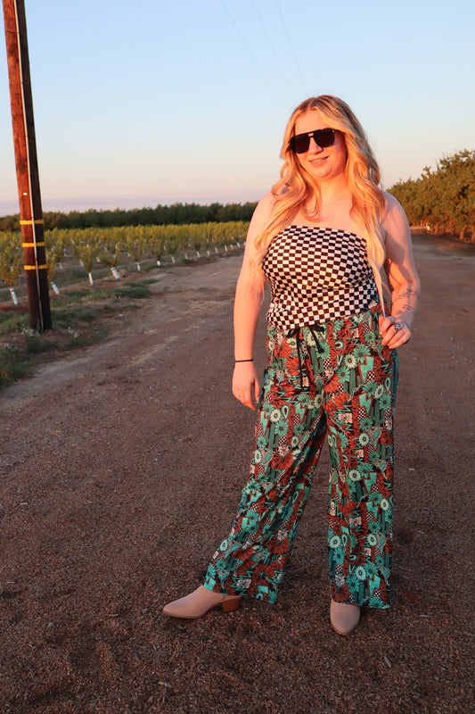 Tattoos in Turquoise Pants