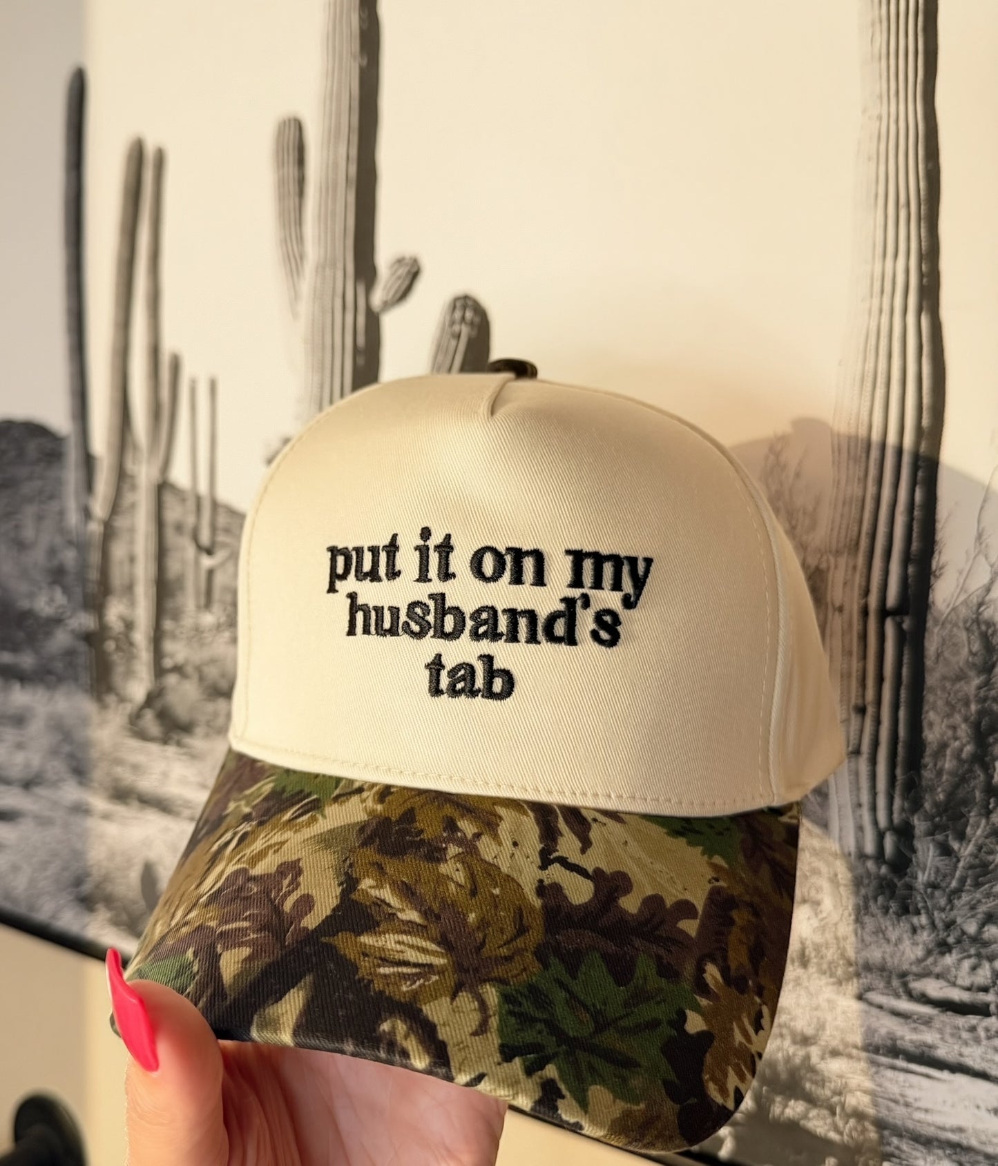Put it on my husbands tab camo trucker hat