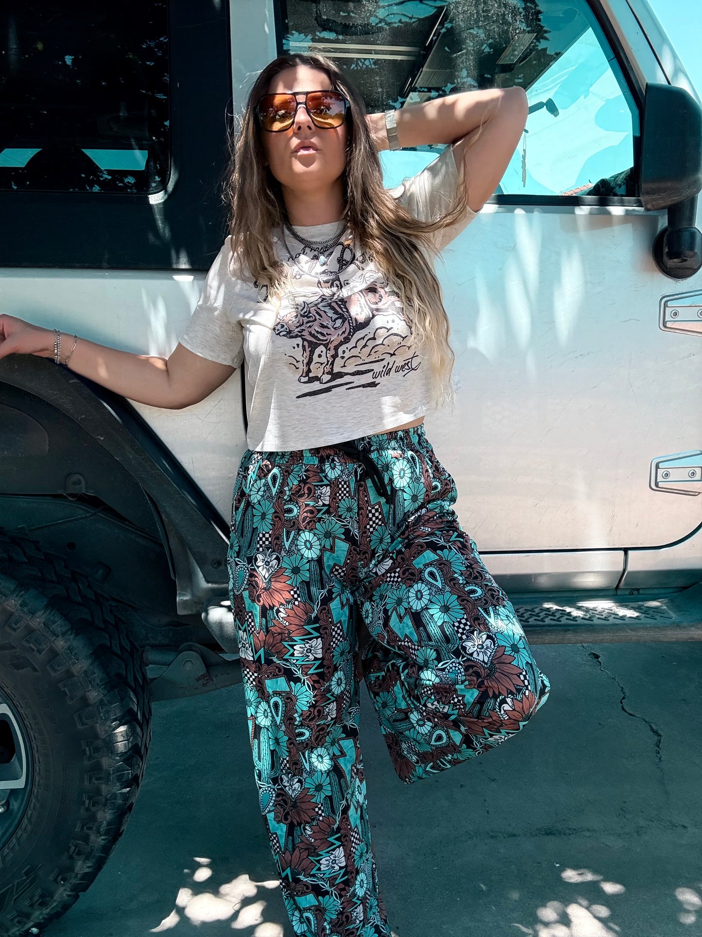 Tattoos in Turquoise Pants
