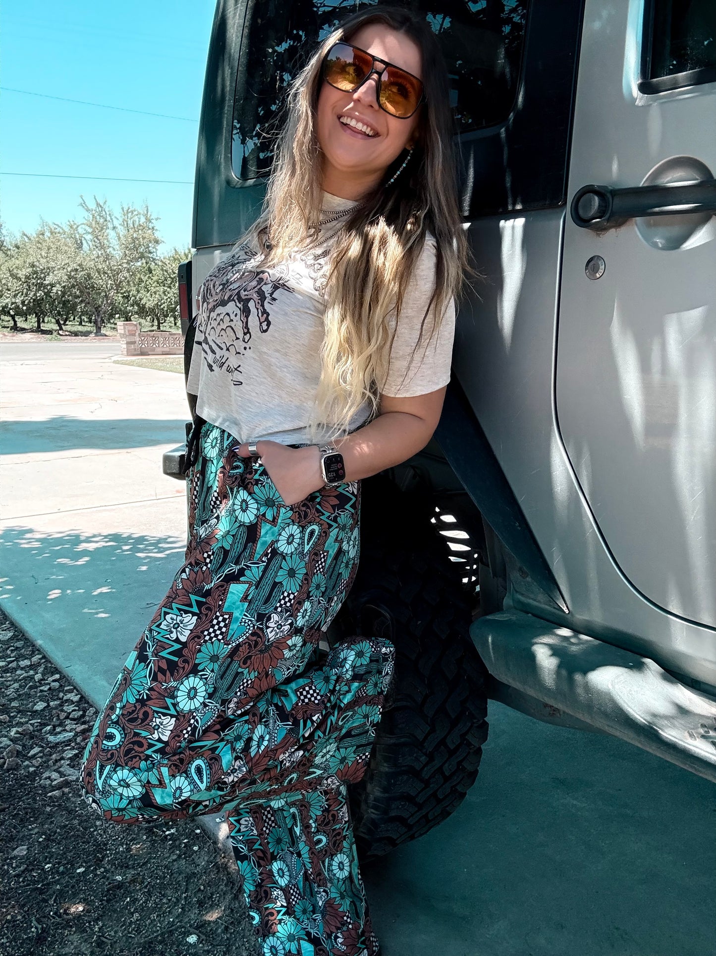 Tattoos in Turquoise Pants