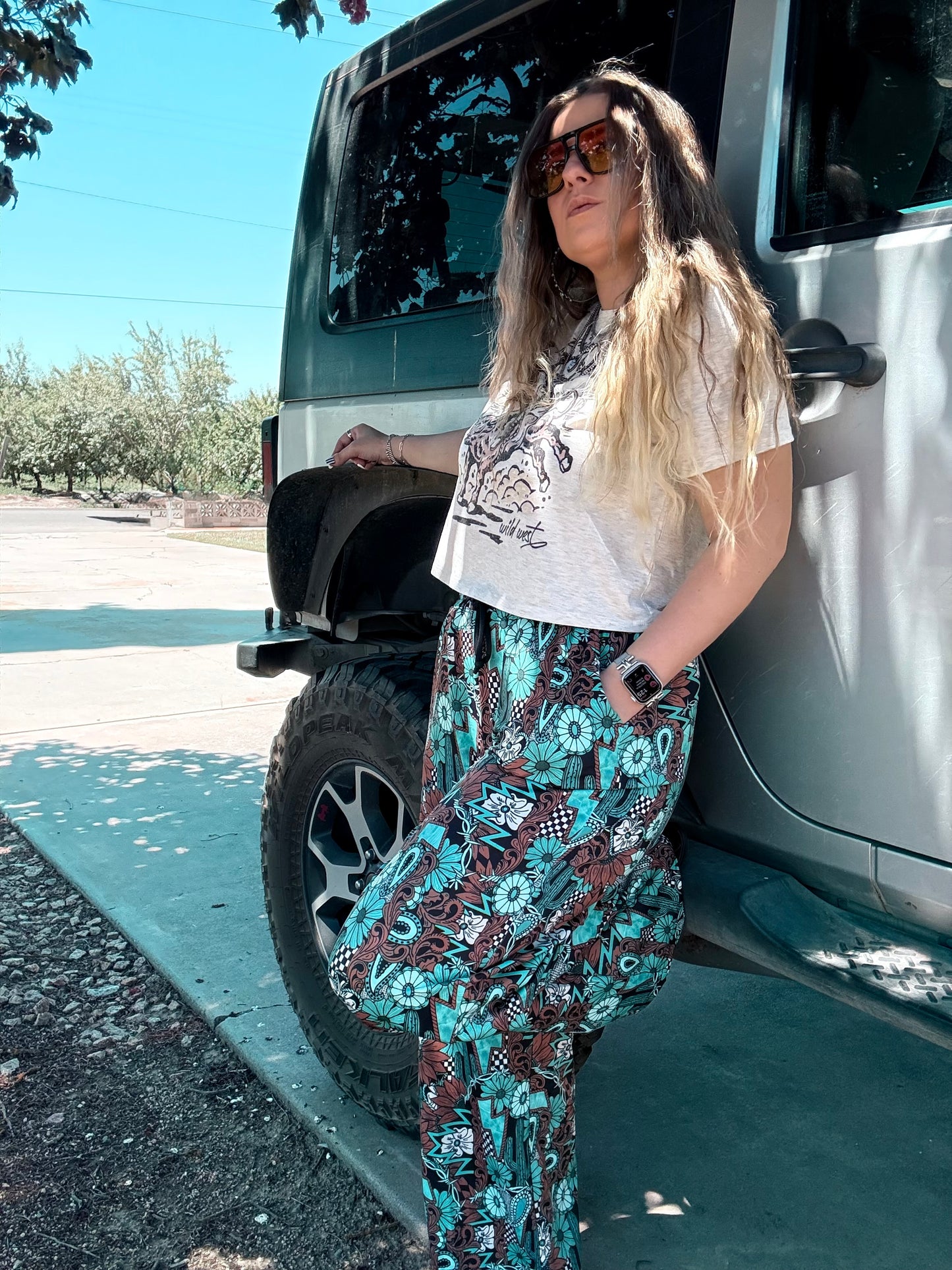 Tattoos in Turquoise Pants
