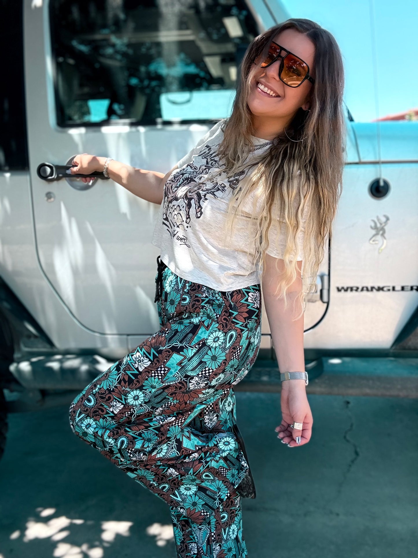 Tattoos in Turquoise Pants