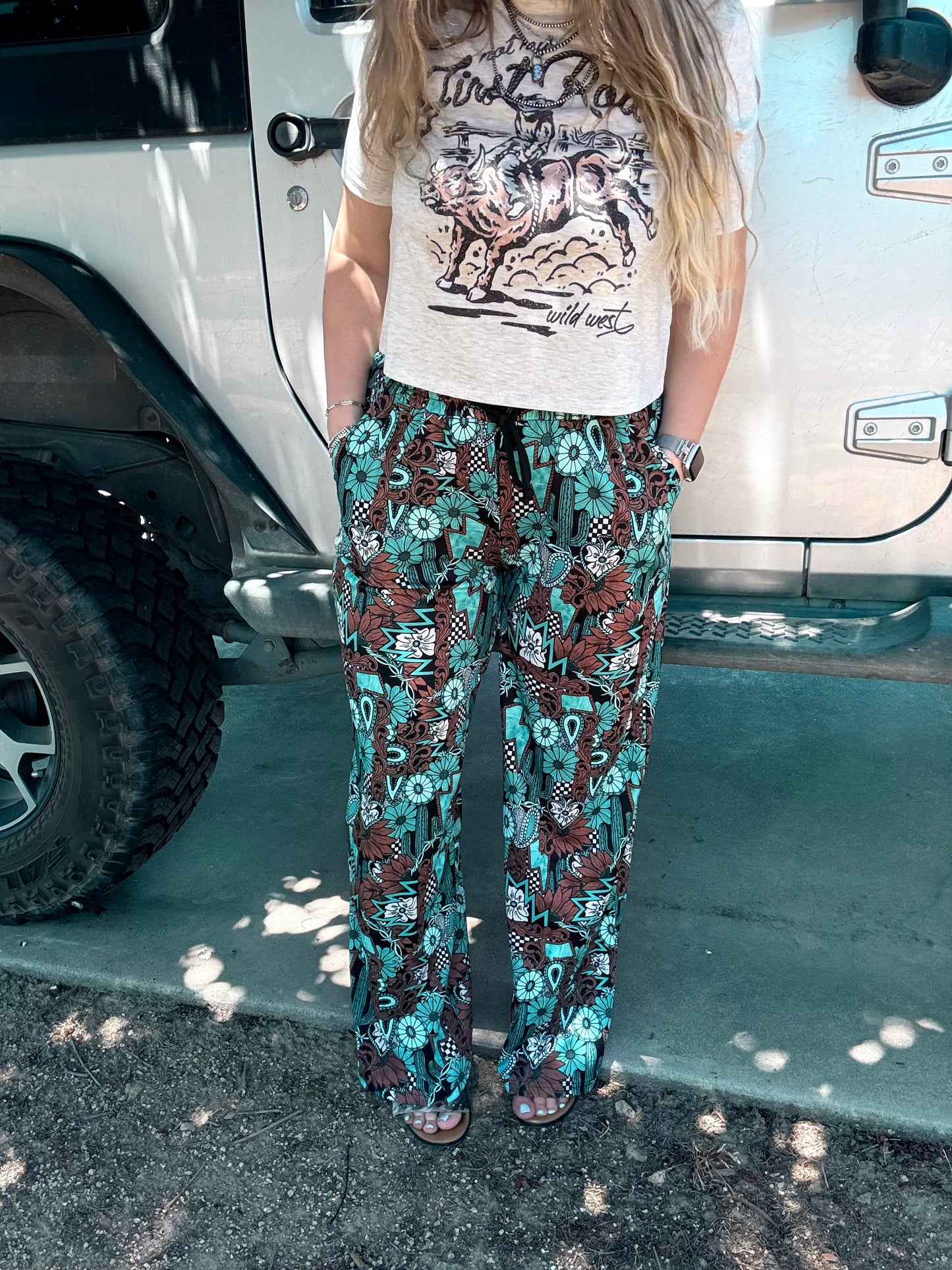 Tattoos in Turquoise Pants